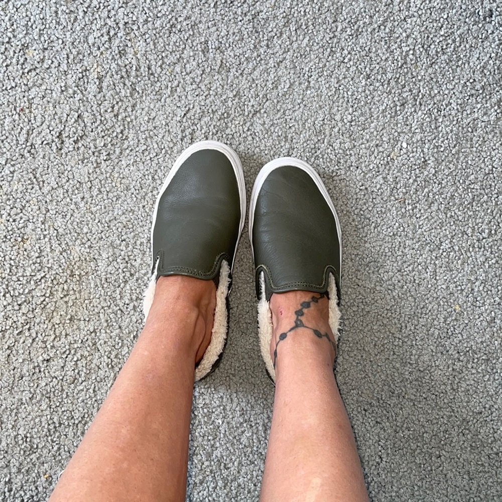 Vans olive green slip on sneakers.